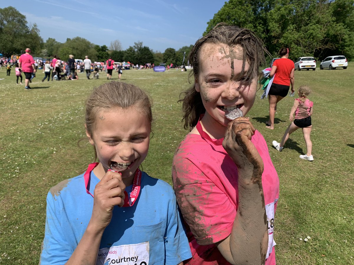 Two very happy young ladies after their <a href="/raceforlife/">Race for Life</a> Pretty muddy this morning