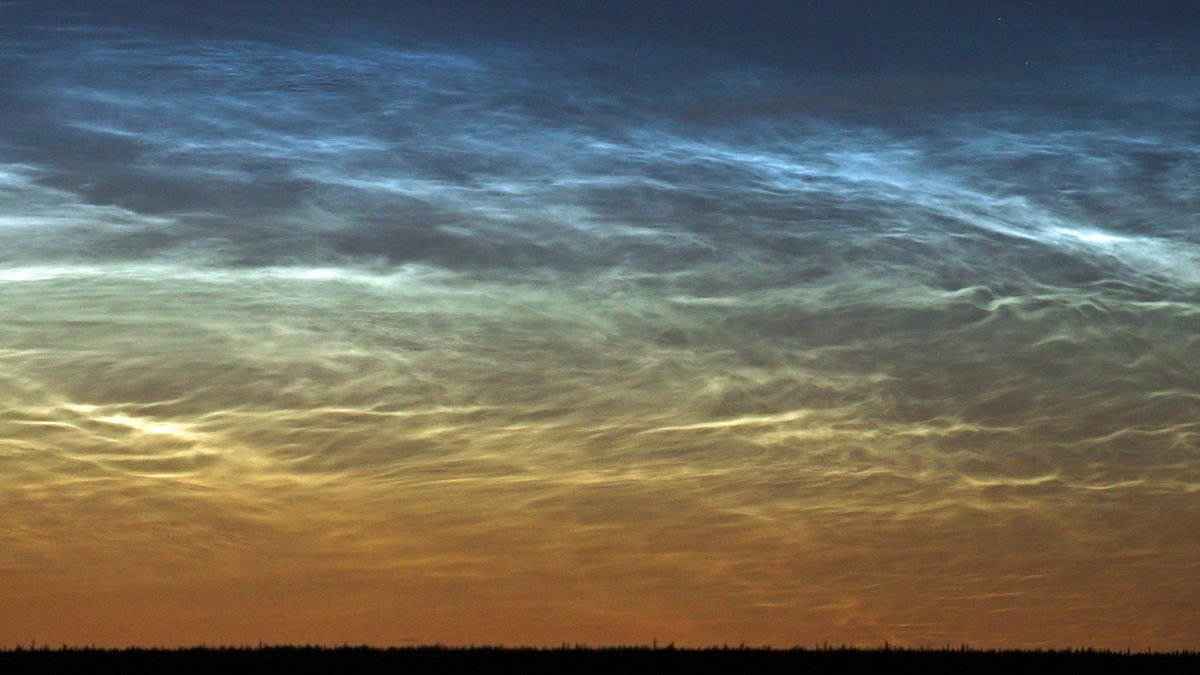 Posting my #APY15 entries for this year:

1. Green Noctilucent Clouds
During a particularly intense display on 23 June 2022, the clouds were tinged yellow and blue and in the transition area between the two, the clouds were a distinct green colour.

#Astrophotography
