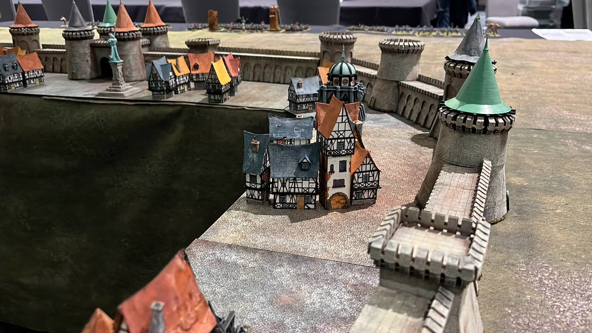 Setting up for the Siege of Altdorf at #Kublacon. 10mm fantasy.