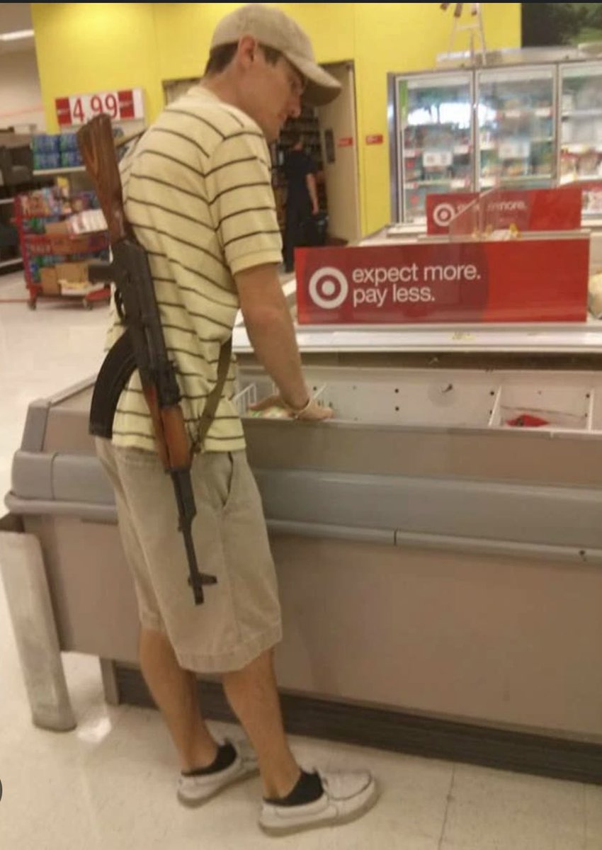 Bro needs his AK to protect himself from those scary Target rainbows. 🌈