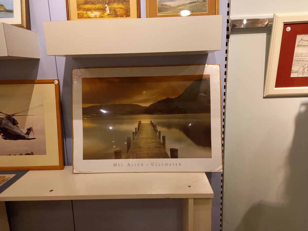 Those cliched wooden jetty photographs are no longer selling #charityshop