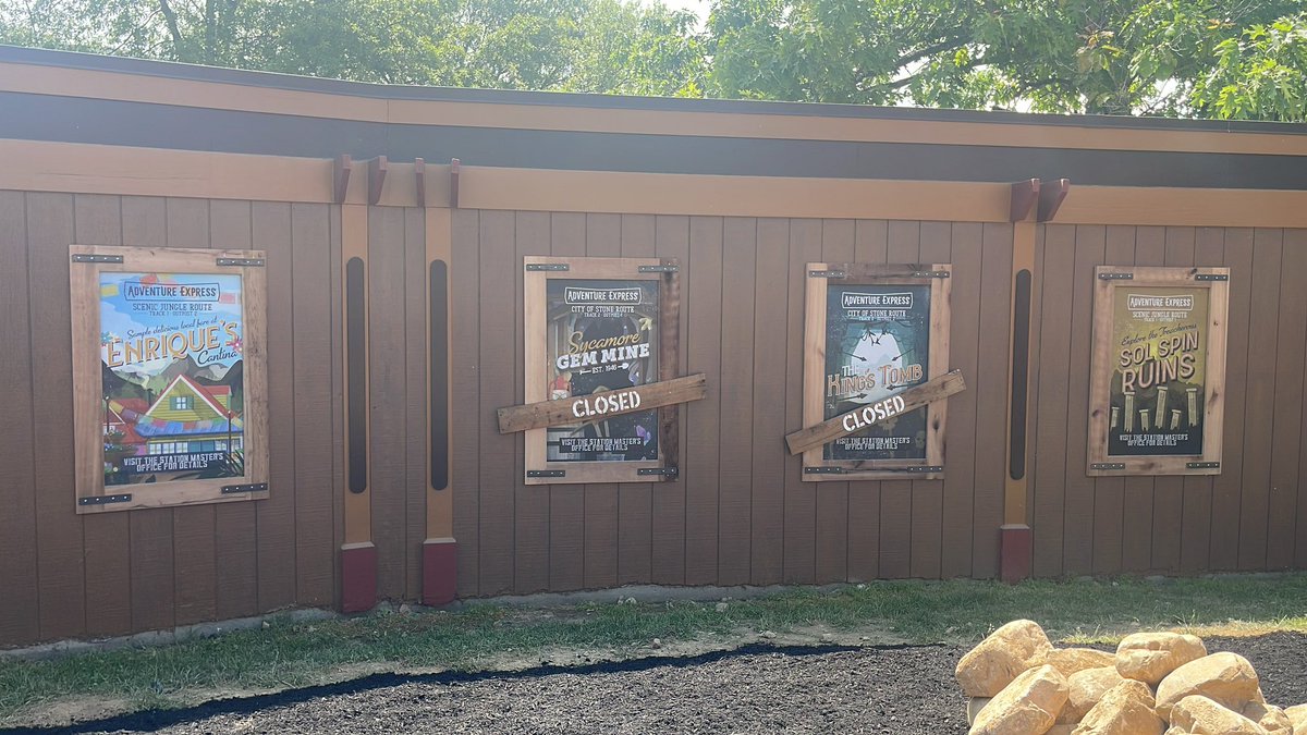BuckeyeCoaster's tweet photo. The posters of the #AdventurePort Adventure Express Queue Area! Love all the Easter eggs that @KingsIslandPR left for those fans of the park and ride! #kingsisland #adventureexpress #newin2023 https://t.co/yklZuLKlmR