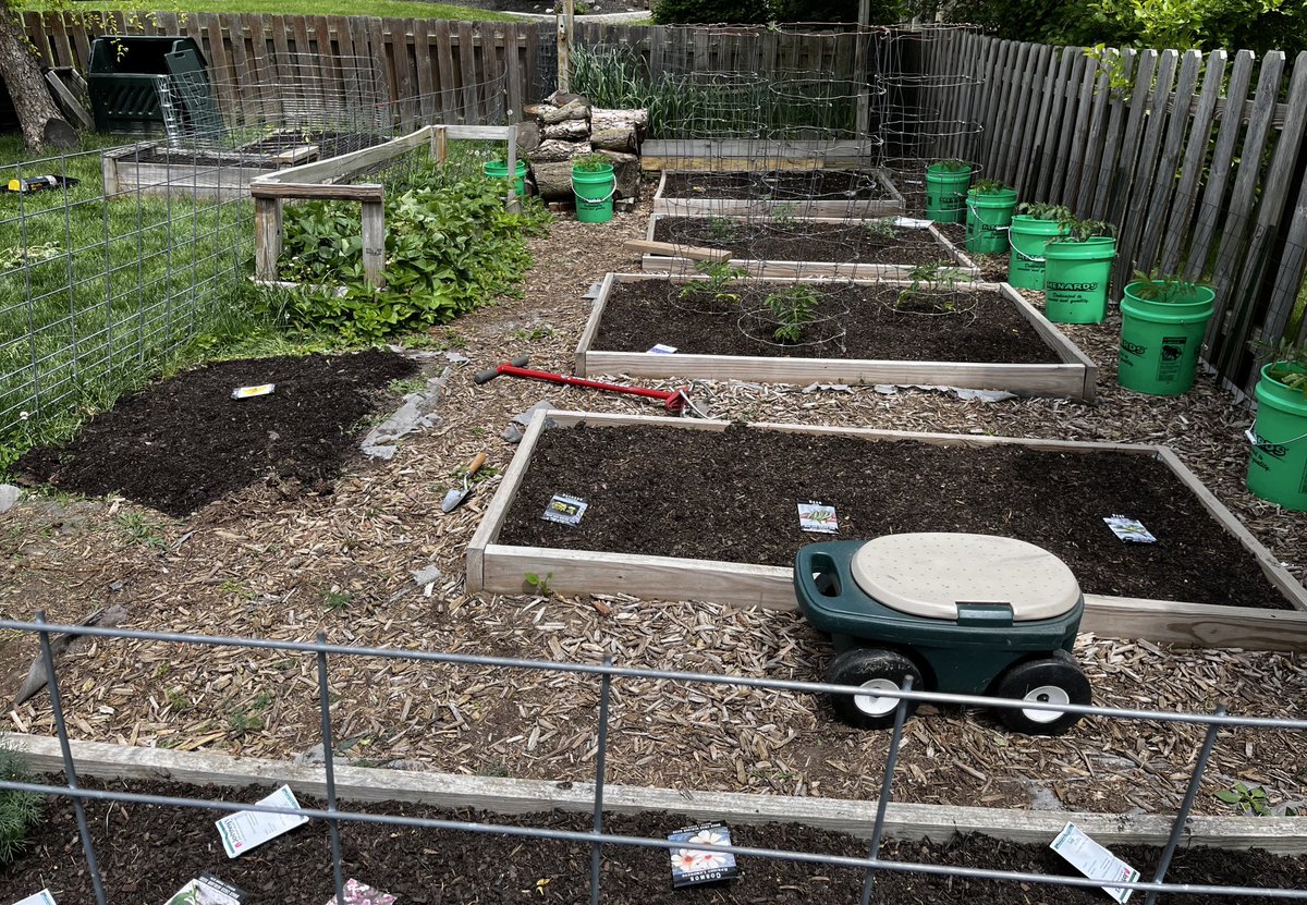 The garden is in. We are doing some corn, heirloom squash, beans, peas, carrots, garlic, lettuce, spinach, edamame,cucumbers,radishes,herbs,shallots, flowers, peppers, and 16 tomatoes. This is just for the backyard. Pumpkins and grains are going in the front/side yard.