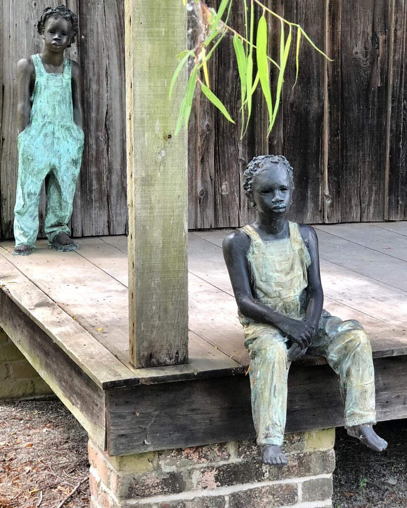 Visiting the plantations near New Orleans is a sobering and eye opening experience. The enslaved children of @whitneyplantation were taken from their mothers by the age of 10, and are depicted without eyes throughout the property to signify their hopelessness. It’s such a