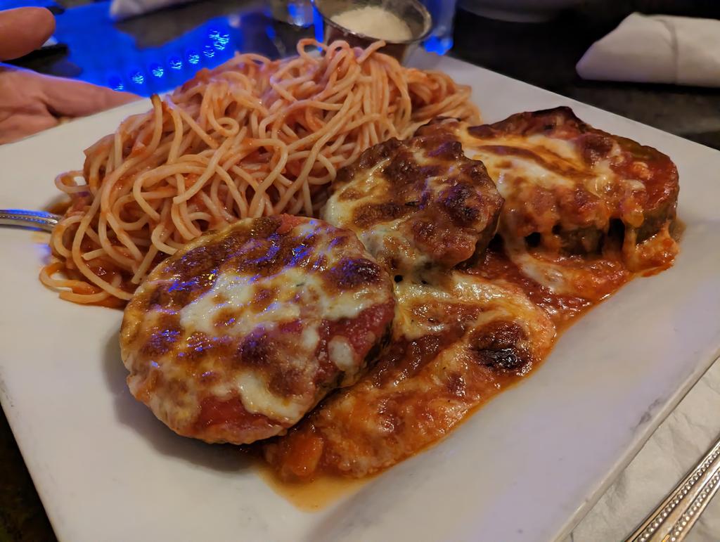 Who'd like a plate of spaghetti and eggplant parmesan?