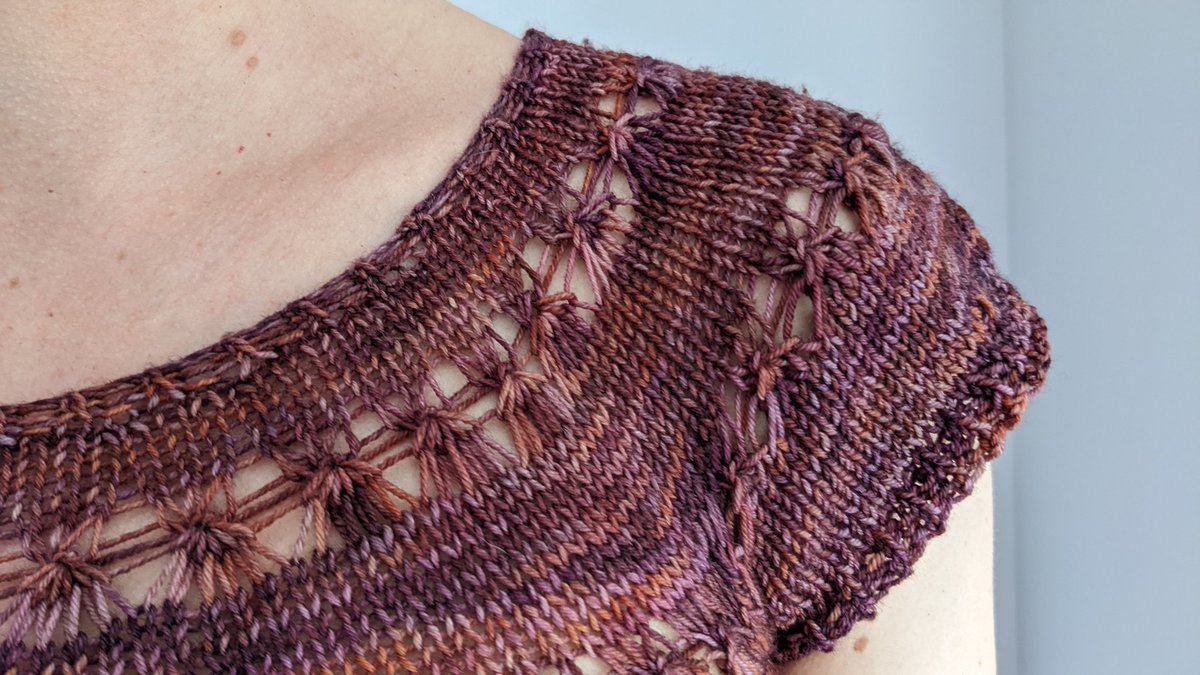 A little close up of the lace yoke on my new Pollokshaws Tee/ Sweater (there's instructions for long sleeves too!)

The pattern is still 50% off, too - use coupon code SHAWS50 on Etsy,  Ravelry, Payhip or my website.  Linktree link in bio! #KnittingTwitter