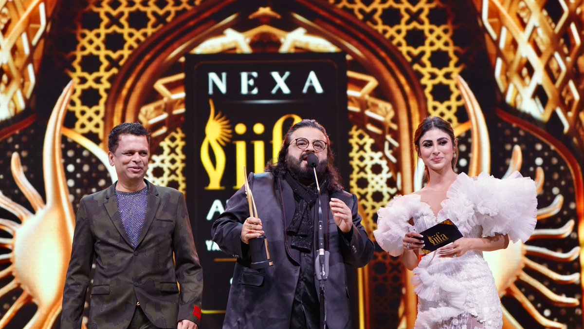 #Pritam receives the trophy on behalf of #ArijitSingh for winning the IIFA trophy for the category 'Playback Singer - Male' for his melodious track 'Kesariya' from the film #Brahmastra Part 1-Shiva. 

#IIFA2023 #IIFAONYAS #YasIsland #InAbuDhabi #NEXA #CreateInspire #SobhaRealty