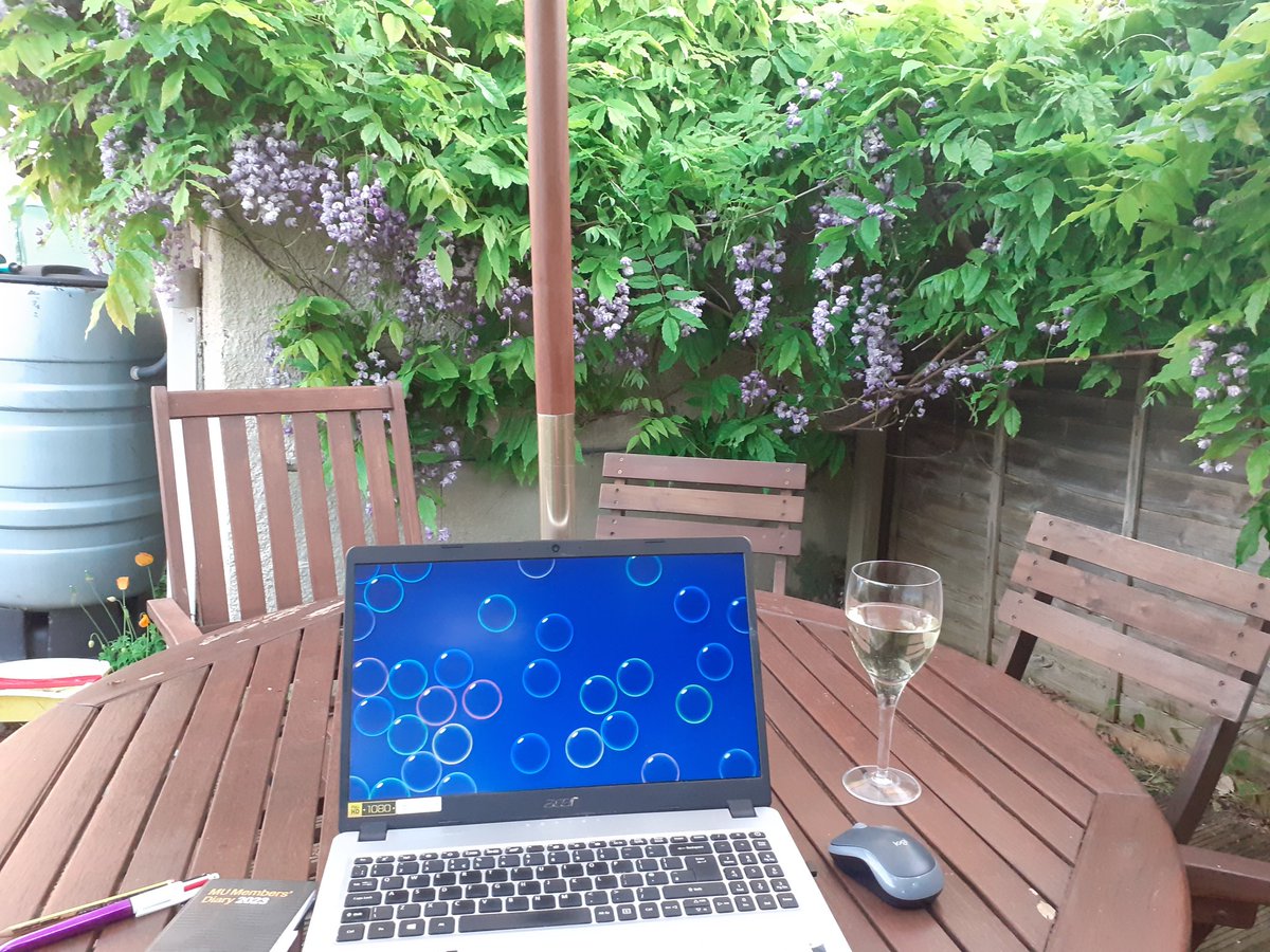 Loving this warm sunny weather, means I can use my 'outdoor office' for doing admin for my freelance life under a lovely light evening sky, with birdsong as a musical backdrop #decking #coldwine #gardenlife #eleventybillionemails #summer