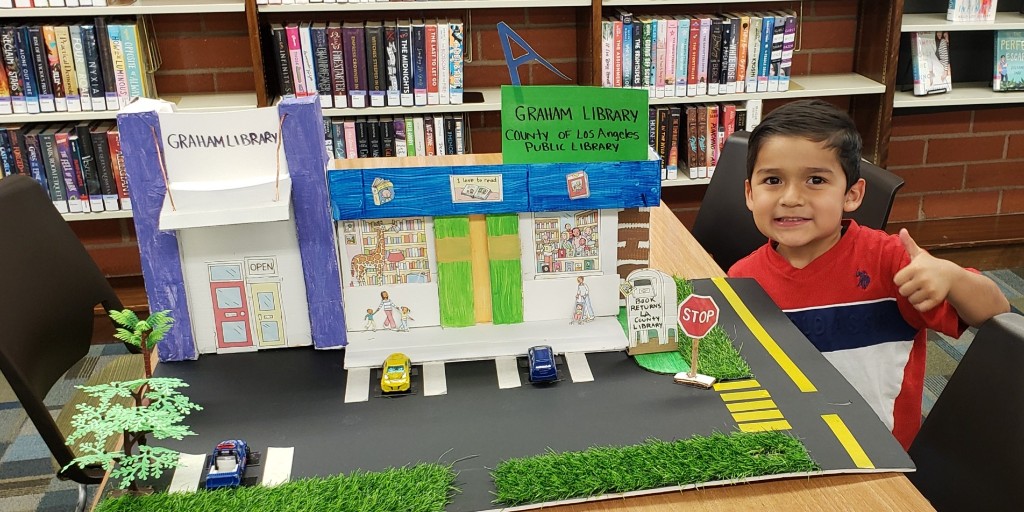 LACountyLibrary's tweet photo. #LibraryHighlights Oscar was given a school assignment to pick something in his neighborhood that represents the community. He picked Graham Library! How awesome is that? 😍 https://t.co/iLnduRof6T