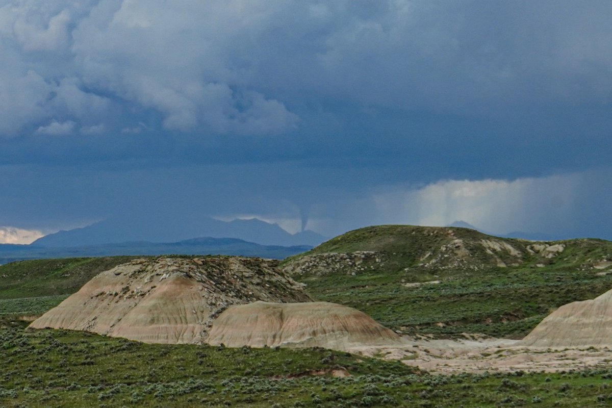 Tornado currently in progress near Irvine, WY. Began at 2:17 p.m. Photo from 2:19 p.m. #wywx @NWSCheyenne