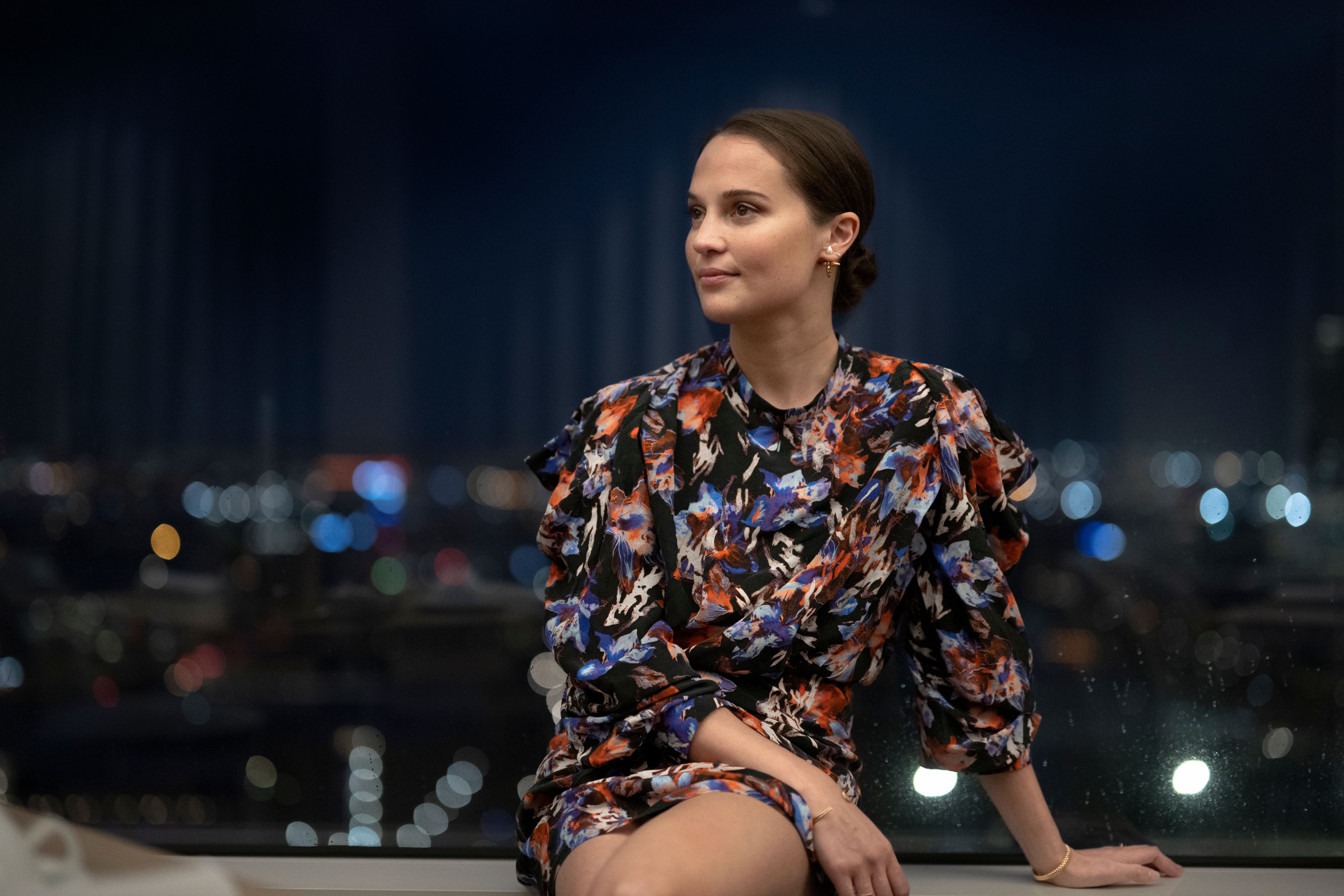 Alicia Vikander is every inch the doting mum as she enjoys a day