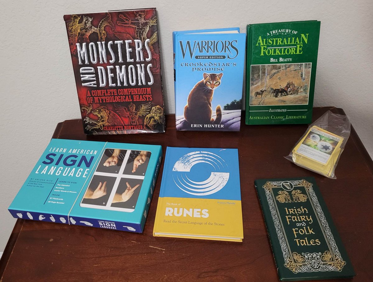 Back at it again with a #bookhaul!
#Pokemon #folklore #warriorcats #monsters #demons #faeries #cryptids #pokemoncards #mythology #signlanguage #runes