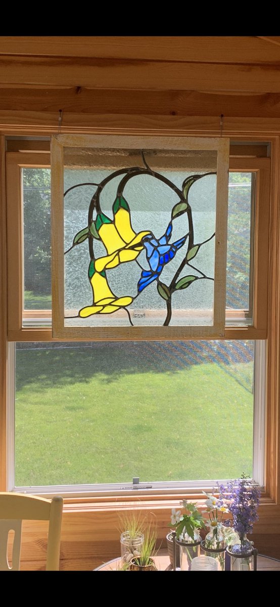 I found this piece of stain glass at an estate sale a couple years ago. I loved it & knew Id do something with it. My husband framed it & hung it on our 3 season porch & It looks beautiful in the sun. #handmadeart