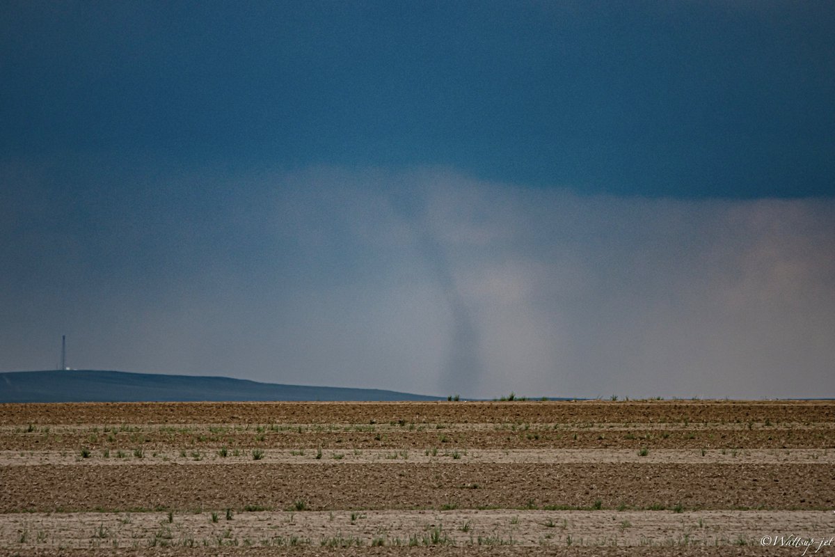 The landspout tornado earlier today near Cheyenne, WY seen from Briggsdale, CO! This was my first tornado on my first official chase! @NWSCheyenne #wywx #cowx
