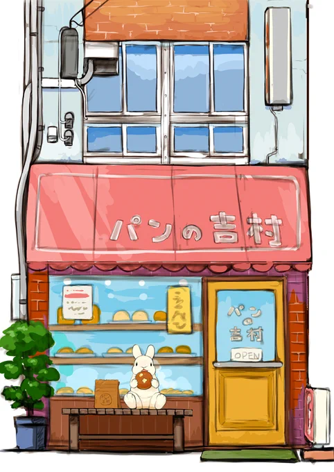 店先のベンチでパンを食べるウサギ