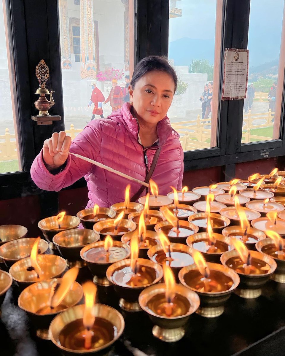 inquirerdotnet's tweet photo. LOOK: Former vice president Leni Robredo shares photos of her recent trip to Bhutan. She also shares her insights from the trip, including how the landlocked country is the only carbon-negative country in the world. | 📷: lenirobredo /IG https://t.co/M9j8A6iXUT