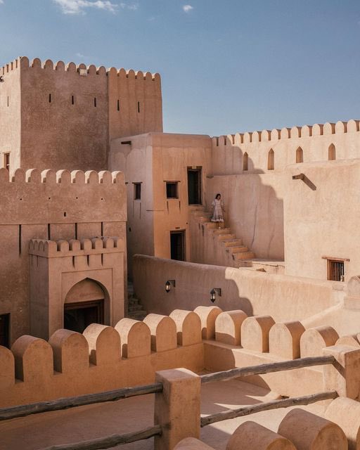 ExperienceOman's tweet photo. The most famous pose at one of the most famous historical monuments in Oman 🇴🇲

Share yours with us via #OmanByYou or get your own capture at @nizwafortoman during your upcoming journey to Oman✨

📸right: bucketlistbums 
📸left: televisionofnomads

#ExperienceOman 🇴🇲 https://t.co/Z86SOclgML