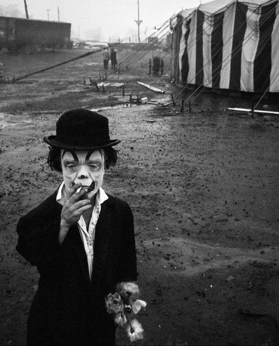 In 1958, in Palisades, New Jersey, a performer named Jimmy Armstrong, known as The Dwarf Clown, entertained the audience at Clyde Beatty Circus. This moment was captured by photographer Bruce Davidson as part of his renowned 'Circus' series. 'He was standing alone outside the…