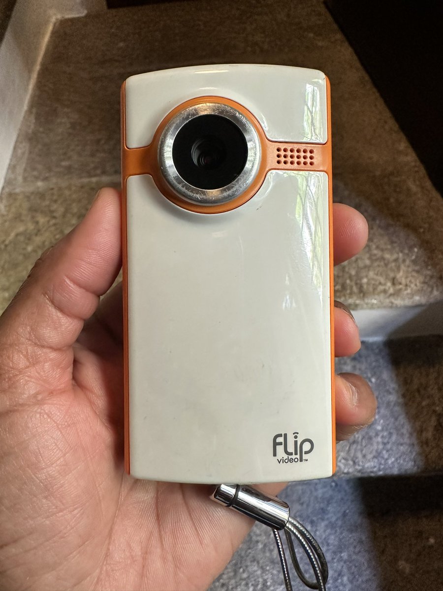 staywoketarot's tweet photo. Went to the cellar for a light bulb and found this. My #FlipVideo cam. I bought it in 2007. Thought I'd lost it in the various moves. IT STILL WORKS! Can't set the year past 2020 though. 😂 https://t.co/mZzS3dwwTQ