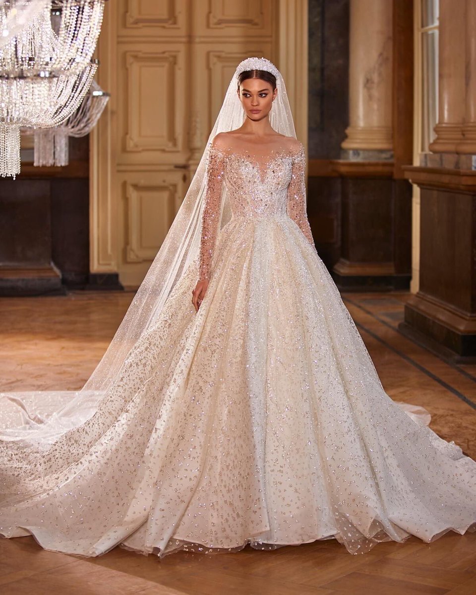 Xiaothao_Hong's tweet photo. This immaculate #MillaNova princess wedding dress features illusion neckline and sleeves bathed in thousands of sparkly beads and sequins throughout the entire gown with a dramatic train.✨✨✨ https://t.co/UsIvLG1beo https://t.co/Bhx9juXzz4