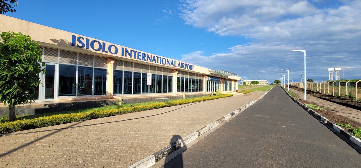 mohammedhersi's tweet photo. Isiolo International Airport 

A beautiful Airport under the Vision 2030 strategy including Lapsset.

Now that this facility is up and ready we should make it work .

1. The export of Miraa to Somalia should be moved from Wilson that is congested to Isiolo. Nyambene hills that grow the twig is visible from the airport so why rush miraa to Nbi. Kenyans will also be spared the dangers of those speeding dare devil land cruisers.

2. Timau and entire good part of Nyanyuki  is now growing flowers and vegetables for the export market. Why truck the consignment to a busy JKIA while the same can be lifted out of Isiolo but cold storage is key.

3. Passenger flights , Nbi. Isiolo.Moyale. will work very well . Incentivise airlines to land here. Fly Jambojet 

4. Tourists. Landing in small caravans across Samburu. Buffaloe springs , Shaba while it has its own charm its not cheap due to aircraft capacity. Incentivise  airlines to deploy bigger aircrafts and the cost of air ticket will then drop by more than 40% to 50%  which means more numbers into the lodges and camps in both Isiolo and Samburu County and even Meru and Maua.

5. Flying school. Isiolo Airport can make an excellent base for a flying school instead of fighting for space at already crowded Wilson.

6. Dry cargo similar to Eldoret  and Isiolo would also do well to handle such cargo.

Well I am also well aware that the runway is not the ideal length for bigger aircrafts but should be fixed since the facility is already up and looking good.

Hon CS @kipmurkomen @KenyaAirports @FlyJambojet @KEPSA_KENYA Isiolo Gov  @GovGuyo  @KTF_Kenya we can chart way forward.

What I have listed is all possible and you don't have to break the bank .

As always I choose to remain an optimist