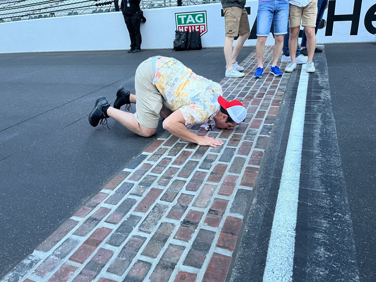 One of the most popular activities of the day — kissing the bricks. It’s an #Indy500 tradition. The original bricks were laid in 1909, but the now-tradition of kissing them did not start until 1996, according to ⁦@IMS⁩. #TrackTeam13 #ThisisMay