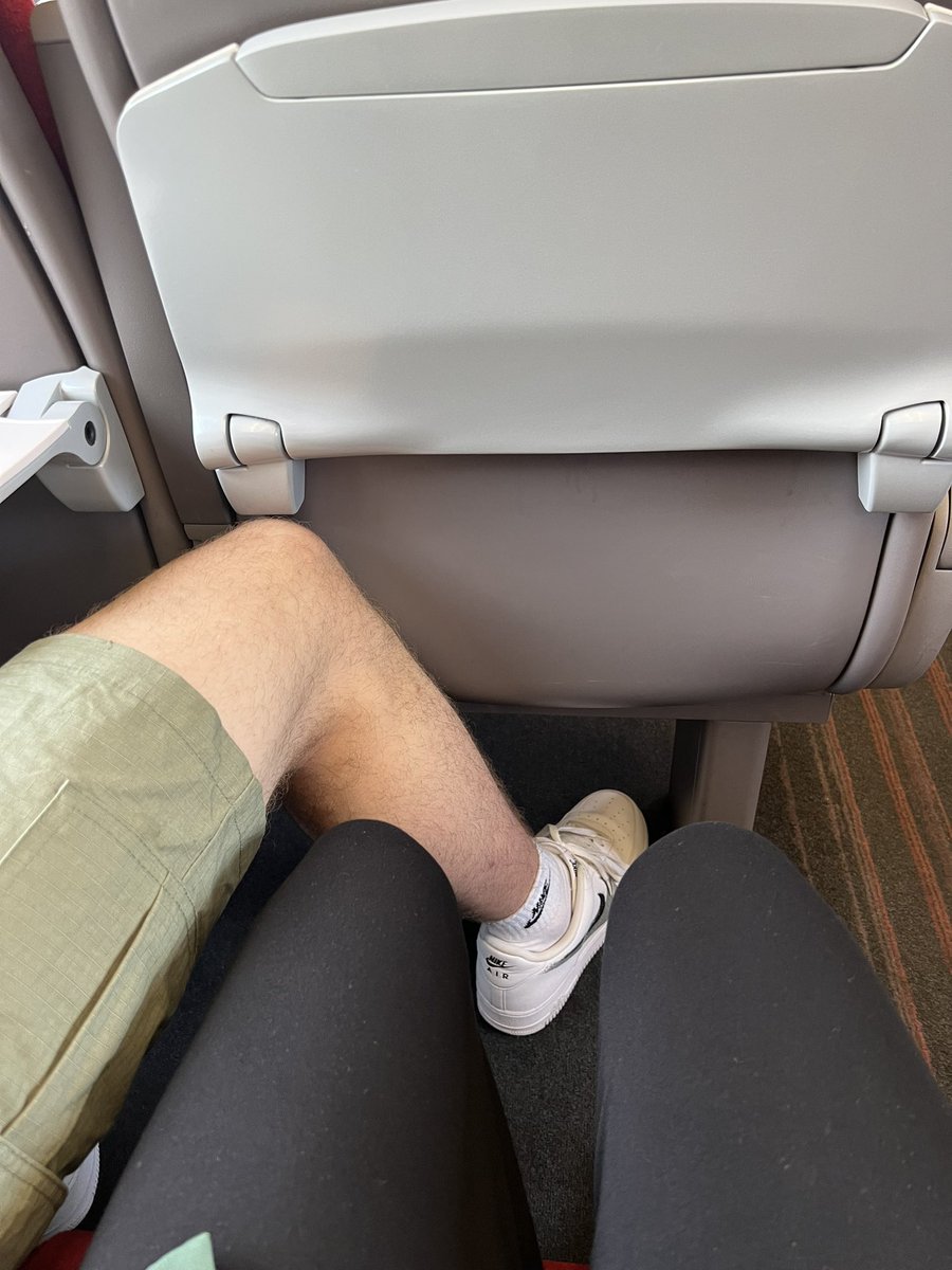 UGH!! Sat next to a really selfish guy who refuses to move his leg from my space. 🤬

Rude to casually kick his leg away?!