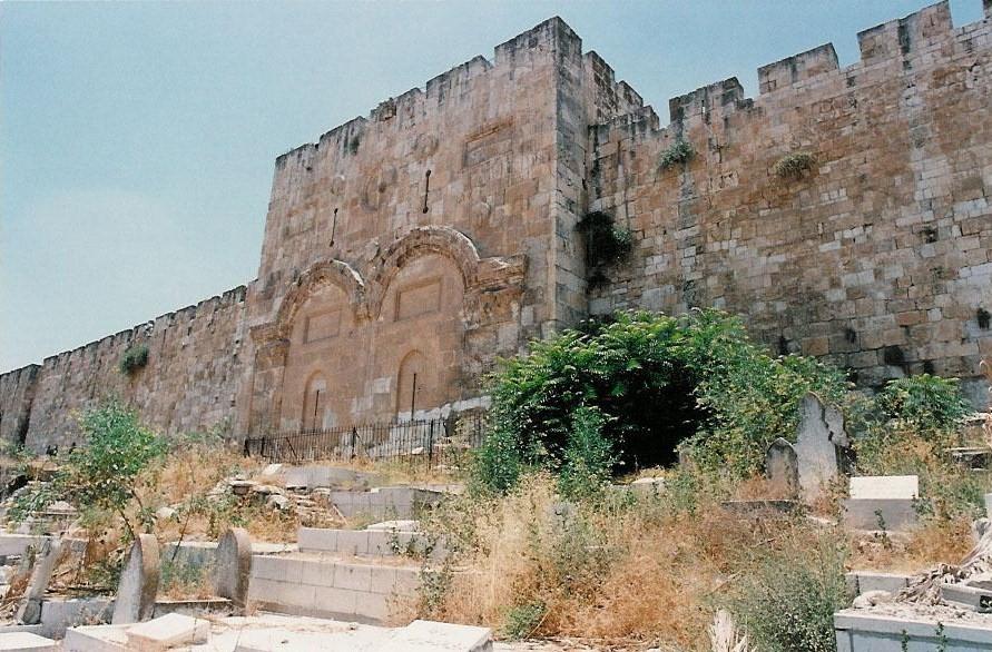 Golden Gate is in the Eastern section of the old walled city facing Mt.of Olives too.

It has been sealed for centuries already by ISLAM   knowing  a Kohen Gadol cannot walk through a 
 cemetery whatsoever and where Moshiach is supposed to enter through .