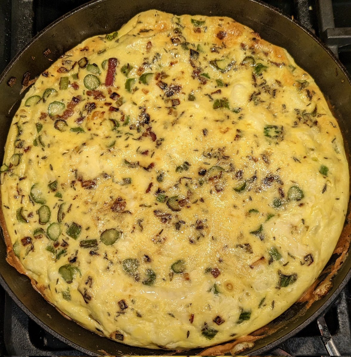 Yum! Asparagus, bacon, and shallot frittata. We're having a hearty breakfast before we go to the baseball game.