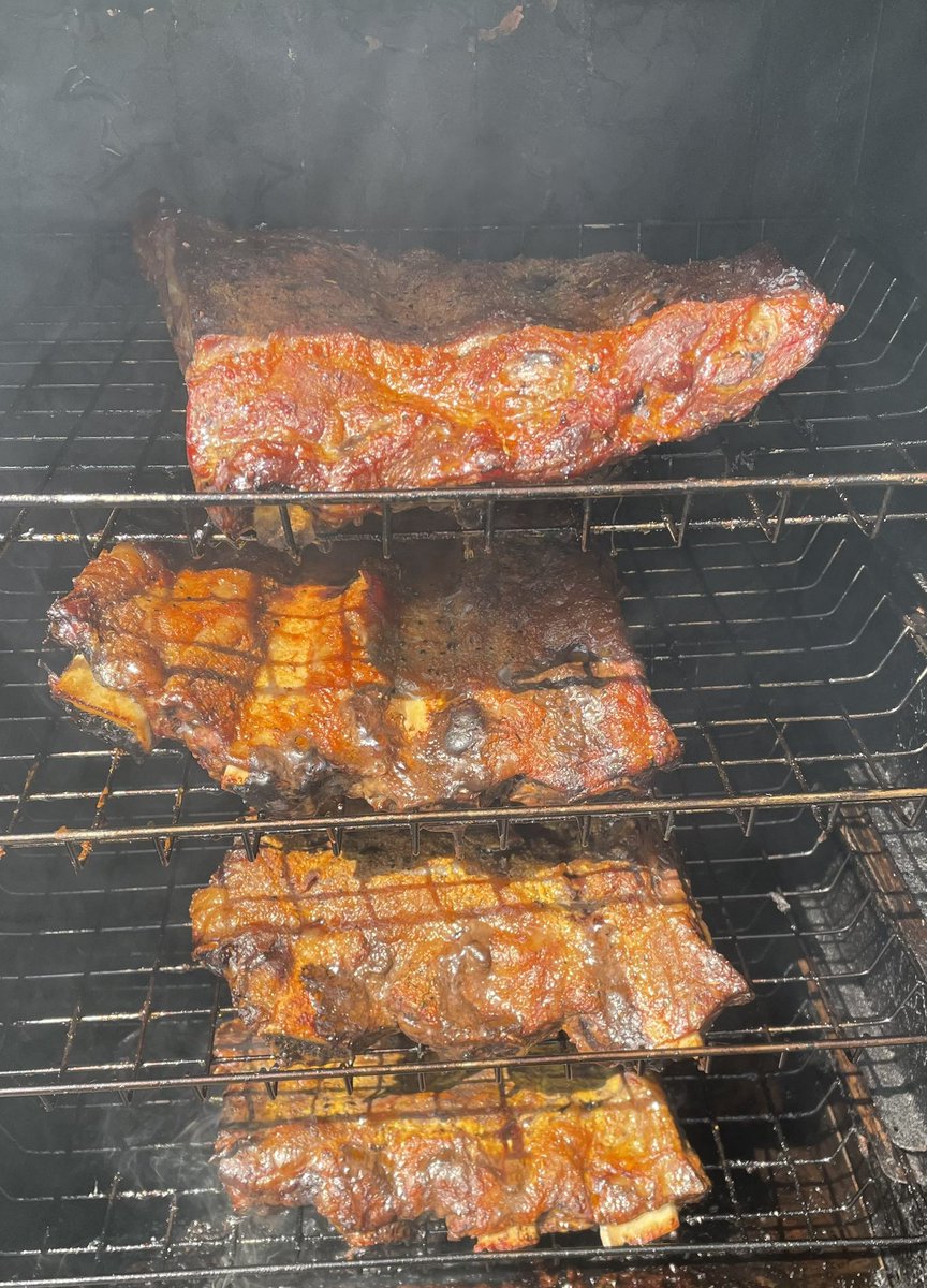 Beauty day to roll the smoke. 2 chonky racks of beef ribs from @acmemeatmarket: 1 binded in French’s Yellow and the other in Rooster sriracha. Then Low and Slow that is the tempo. I’ll try and not screw these up & give them the respect that they deserve. @coreythebutcher