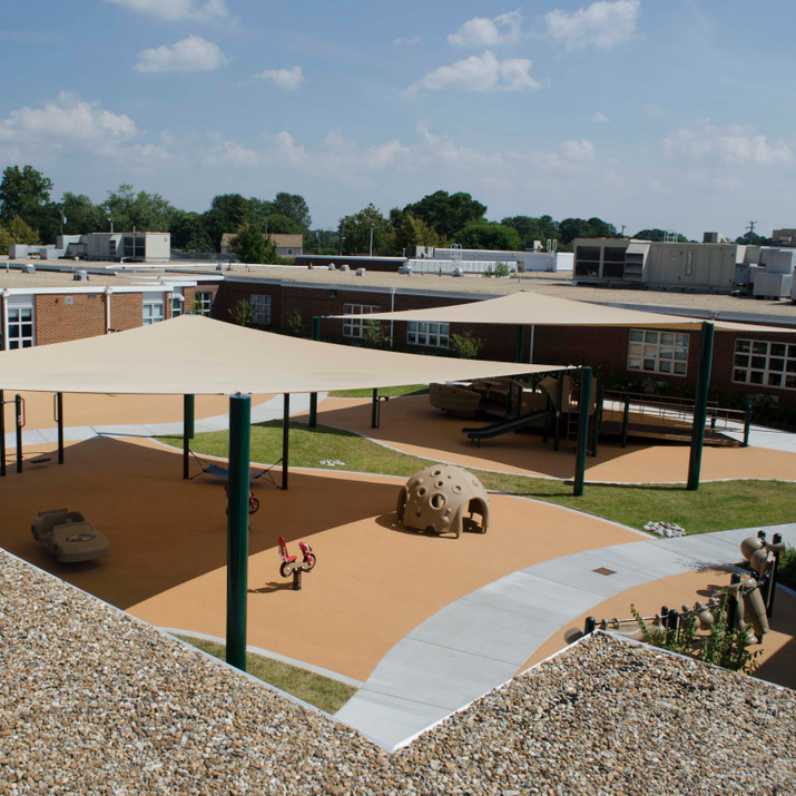 Pembroke Elementary School's 14,000 sq. ft. interior courtyard was designated as a play space for students with physical and neurodivergent differences. However, it was less than optimal for use as a playground until WPL stepped in. The renovated space is now a setting where chil