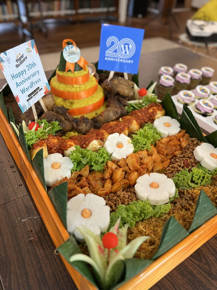 wcjkt's tweet photo. We celebrated the WordPress 20th anniversary in Jakarta with Tumpeng - a way to serve rice with side dishes for special occasion done by people in Java and Bali, but has become something we do all over Indonesia.
Thank you @exabytes_id!
#WP20 #WPID #WCJKT #WordPress https://t.co/8ygs6TBLxh
