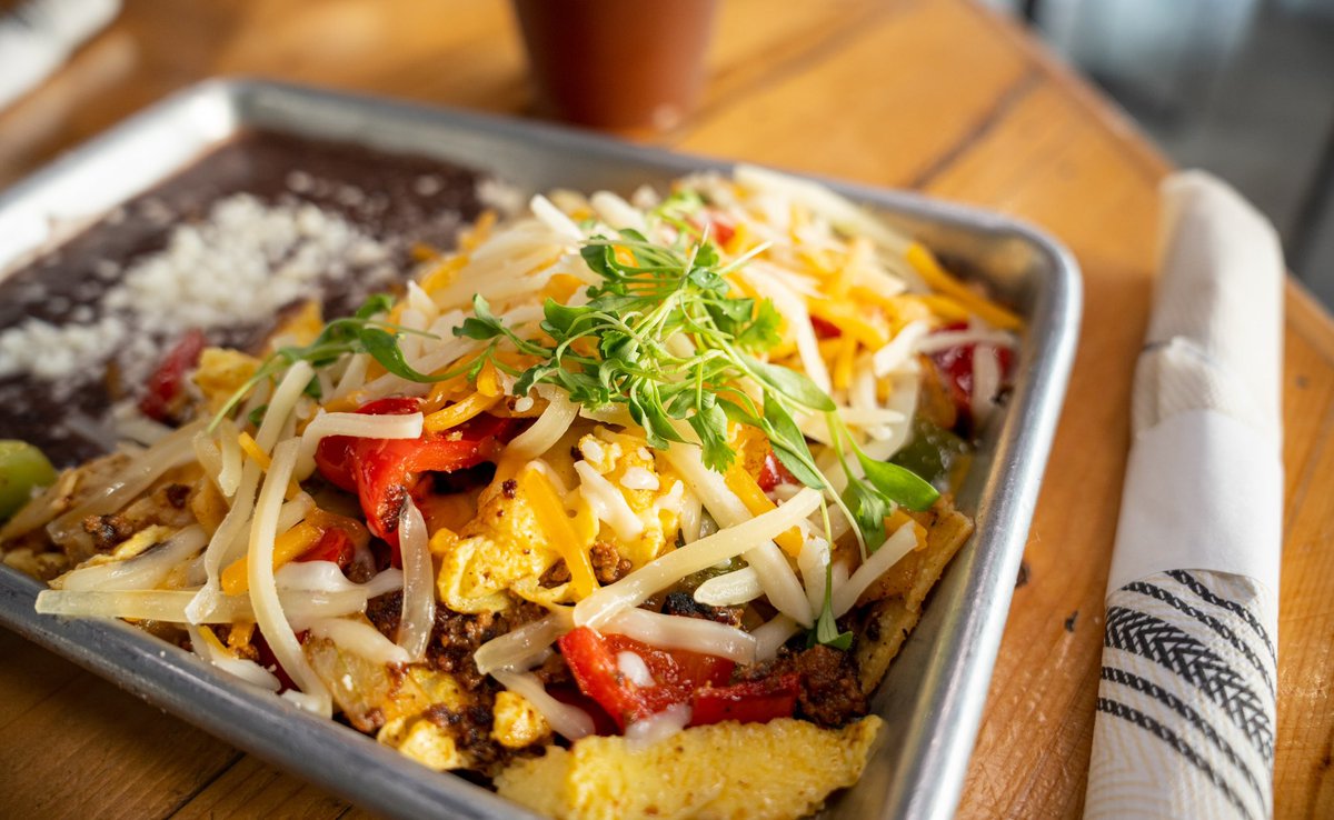 Best way to start your day is with something nutritious and delicious! 🌞

Featuring our Chilaquiles Amigos! 🔥 

Eggs scrambled with assorted cheeses, mixed peppers, onions, tortillas, and salsa verde with a side of black beans. Add chorizo or chicken for some extra flavor. 🤤