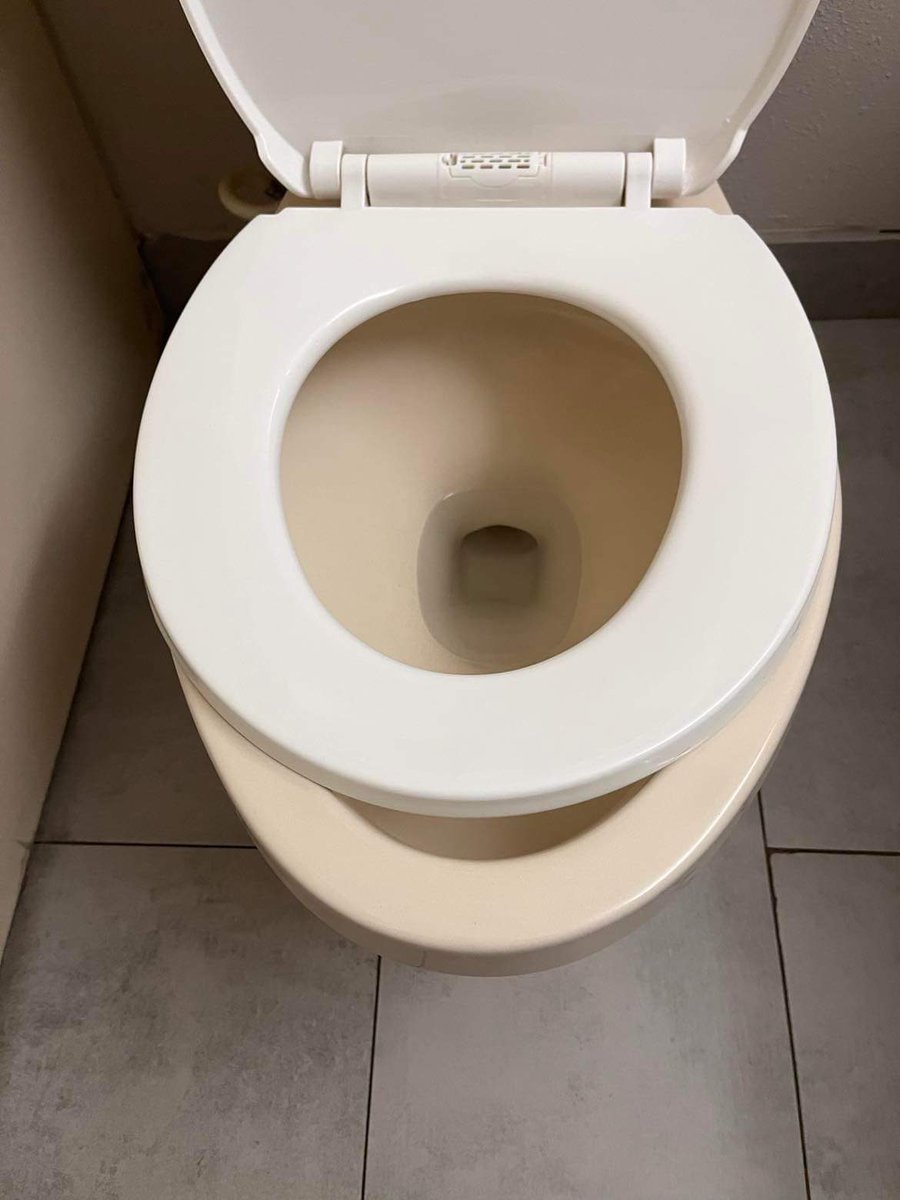 erinpick's tweet photo. @AmericanAir  Dirty, unkept and  where a toilet seat didn't even fit the toilet.. Not a place I believe American Airlines would be proud to know where their customers were staying. 

So American Airlines I am ready to chat when you are about our experience. https://t.co/EUWjX95PQD