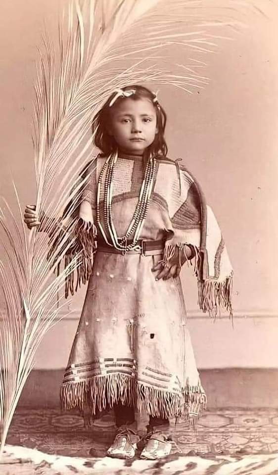 Wa-Ka-Cha-Sha, a Lakota Native American. Her name means Red Rose. She performed for the Buffalo Bill's Wild West Show. She was born to a white father and a Lakota Native mother.(1880-1972.)