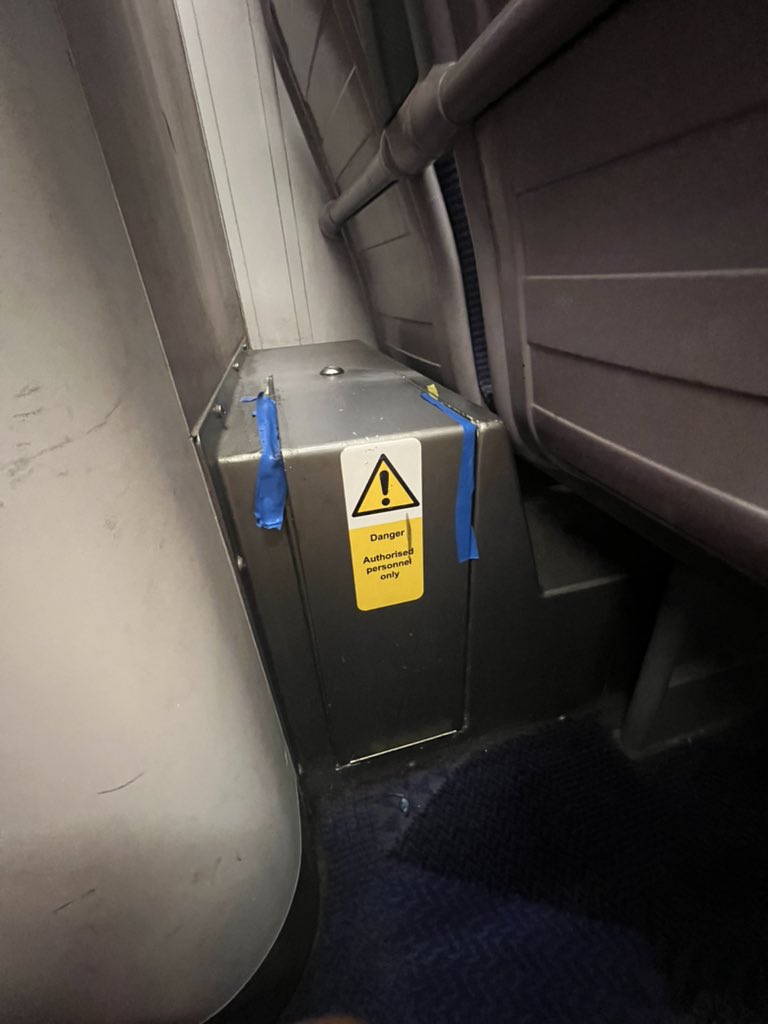 kennycliffe's tweet photo. @TPExpressTrains this isn’t very secure. Electrical tape isn’t great is it. Nor is sitting in the floor. https://t.co/d3Wph8jXTz