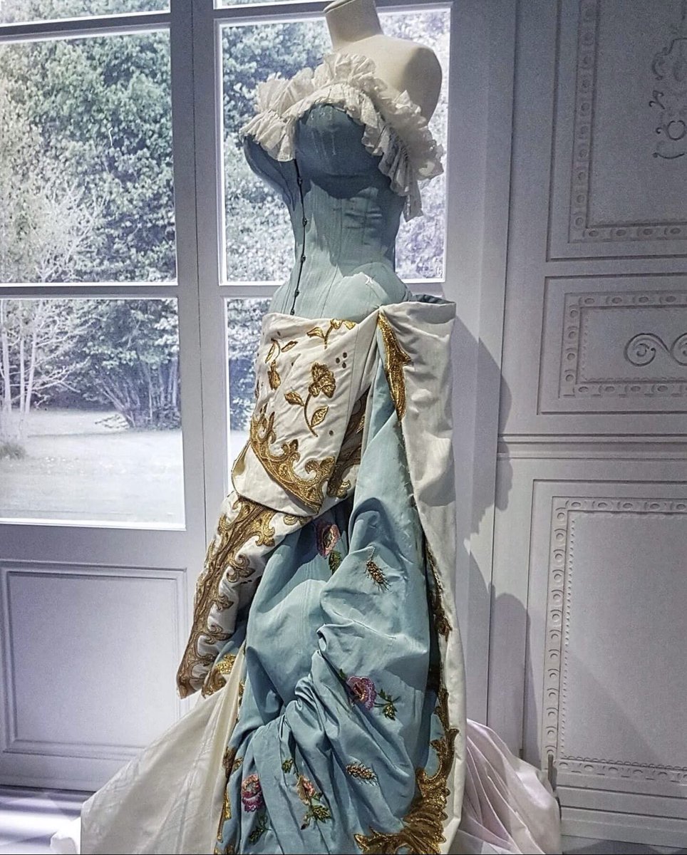 this corset dress from Christian Dior spring 2004 couture is quite insane.