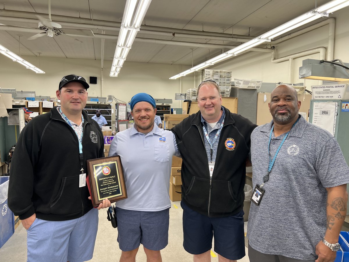 NALC_National's tweet photo. Last week, Minneapolis, MN Branch 9 letter carrier Joseph Redemann was presented with his Hero pin by Region 7 NBA Patrick Johnson. Branch President Scott Bultena, Executive Vice President Joseph Tiemann and Redemann's fellow carriers were also in attendance. https://t.co/8lhMB070AX