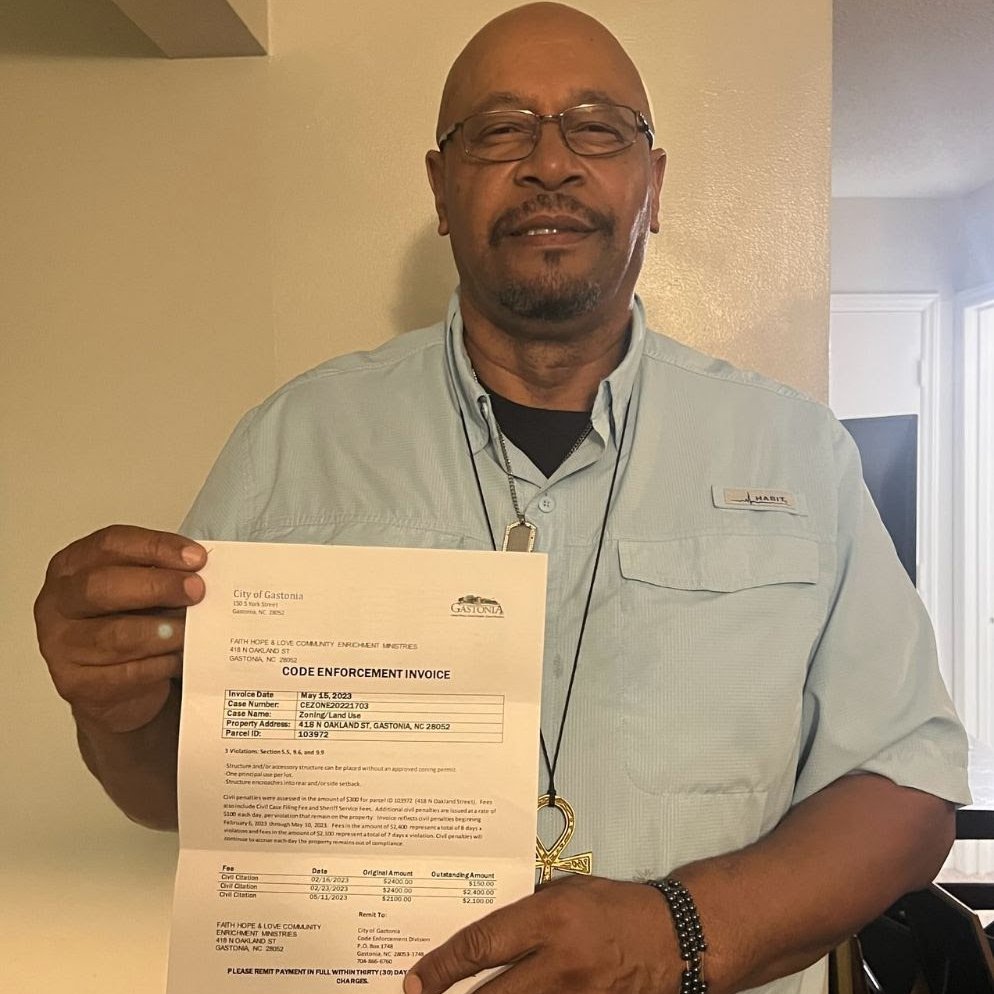 RealSpikeCohen's tweet photo. Remember Pastor Moses Colbert?

The @CityofGastonia government shut down his homeless shelter last year, and after lots of pressure from you, they backed off and let him re-open.

Well, now they're trying to steal his church, his homeless shelter, and the property that it's on.

Why?

Because he's embarrassing them, by doing more to help the homeless with money we've raised voluntarily than they've done with their multi-million dollar taxpayer-funded budget.

For those who are new to this story, this all started last year, when we found out that Pastor Moses' shelter had been shut down, because the City said that churches should stick to "religious services".

Last I checked, helping the poor was a religious service.

Soon after Moses' shelter shut down, homeless people began dying every few days. For years, none had died while the shelter was open.

Gastonia now had the "homeless crisis" the politicians needed to secure millions in funding to deal with it.

And what have they done with those millions?

Great question. As far as we can tell, they bought a seedy motel and...don't appear to even be using it.

When we found out what the city government was doing to Pastor Moses, @YATPOfficial sprang into action, working with @LPNC , Gaston County LP, and other local organizations and activists.

Facing increasing pressure, the City backed off and let Moses re-open the shelter.

We even raised money to purchase trailers for him to use on site, for education and emergency housing purposes.

Every step of the way, Pastor Moses says he has worked with the City, and asked them what he has to do in order to be in compliance with zoning and other regulations.

He was told everything was fine.

And then he received a notice that he owed them $60,000 in fines.

They know he can't afford that.

It's pretty clear that they want to steal Pastor Moses' property and run his church and shelter out of business.

All because he's done more for the homeless community, at no expense to the taxpayer, than the City has done with millions of tax dollars.

It is time for us to fight back again.  I will back in Gastonia very soon, and I hope you'll join me then. More on that soon.

In the meantime, here's the link to contact the Mayor and ever City Council Member in Gastonia. 

https://t.co/XjfEdBjPHe

Go there and RESPECTFULLY let them know what you think about their treatment of Pastor Moses and Gastonia's homeless.

We are just getting started, and we won't finish until the Gastonia city government backs off of Pastor Moses and his shelter, for good.