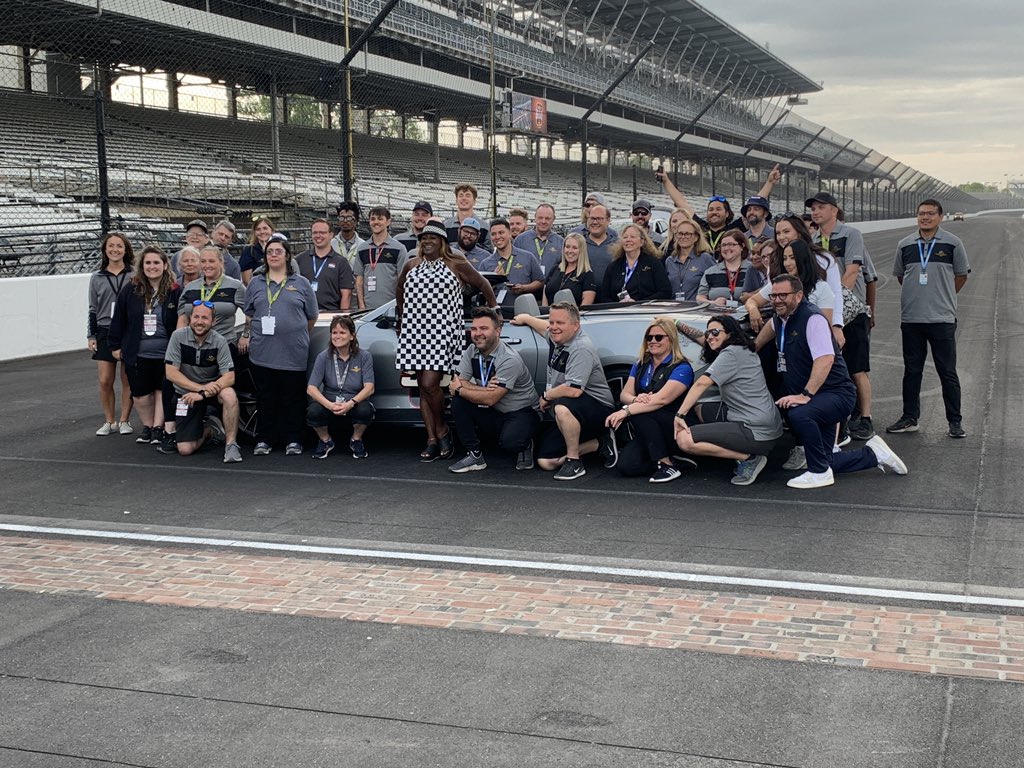 This is Robin Matthews of Indy. Her white Chevy Cruze she calls “snowball” was the car hit by the wheel that flew over the fence in a crash at #Indy500. The car had to be towed. @IMS President @jdouglas4 brought her to the yard of bricks & getting her a ride home. #TrackTeam13