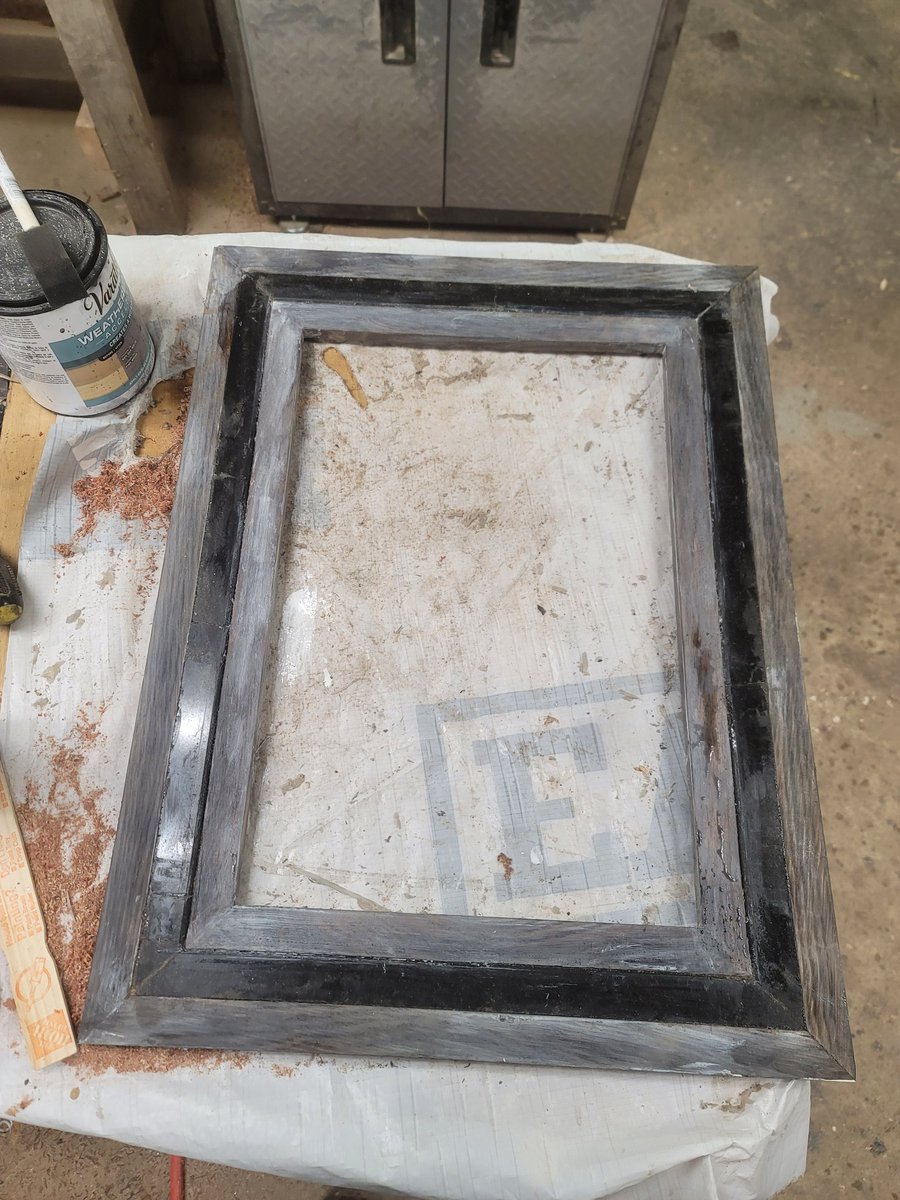 The solid burnt oak and black marble threshold frame is now fully assembled. I did some touch-up to it before I seal it. I ripped the marble thresholds to 1 inch wide pieces on my tile sawout of 4 inch wide pieces with the bevel edge facing towards the center of the frame.