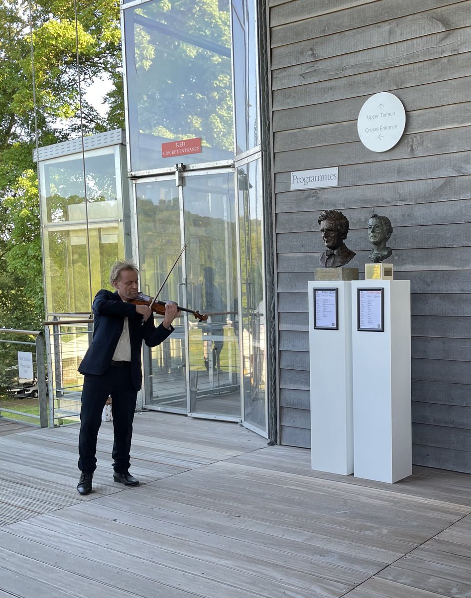 Clare1Adams's tweet photo. A poignant moment as Tom Hankey plays The Lark Ascending at unveiling of bust of Rosalind Ingrams that joins Leonard. Sculptor Elizabeth Mortimer ⁦@GarsingtonOpera⁩ https://t.co/bmvNAhYD1F