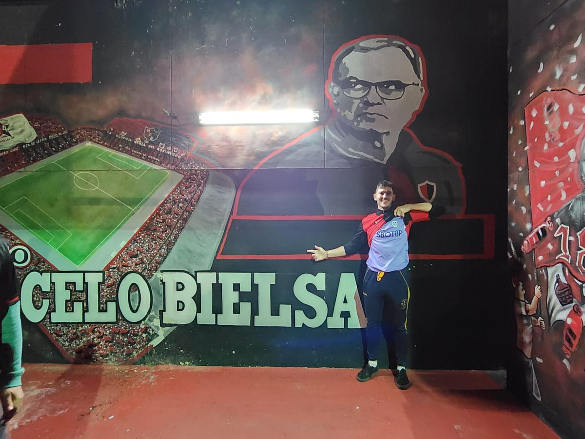 Newells_en's tweet photo. A group of Leeds fans at the Estadio Marcelo Bielsa last night for the Newell's game. 

Some were interviewed by local media in Rosario about the club's relegation. 

They watched as Newell's defeated Godoy Cruz 2-0. https://t.co/dUE0PDL3T3