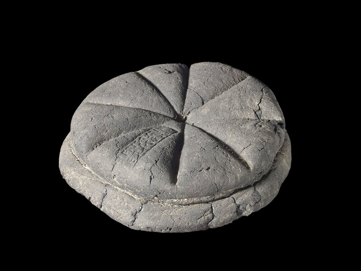 Carbonised bread from Pompeii with baker’s stamp. 79 AD