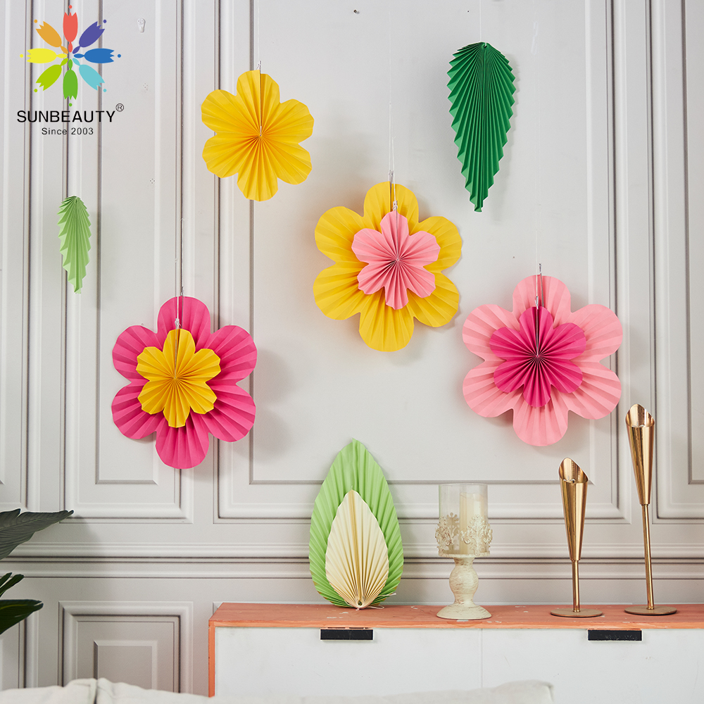 🌸🍃 Summer has sprung with our colorful flower and green leaf paper fan decorations! 🍃🌸 Get 10% off your purchase today with code SUMMER10. Perfect for brightening up any room or event. #paperdecorations #springdecor #flowerfans #greenleaves #discountcode #paperfandecor