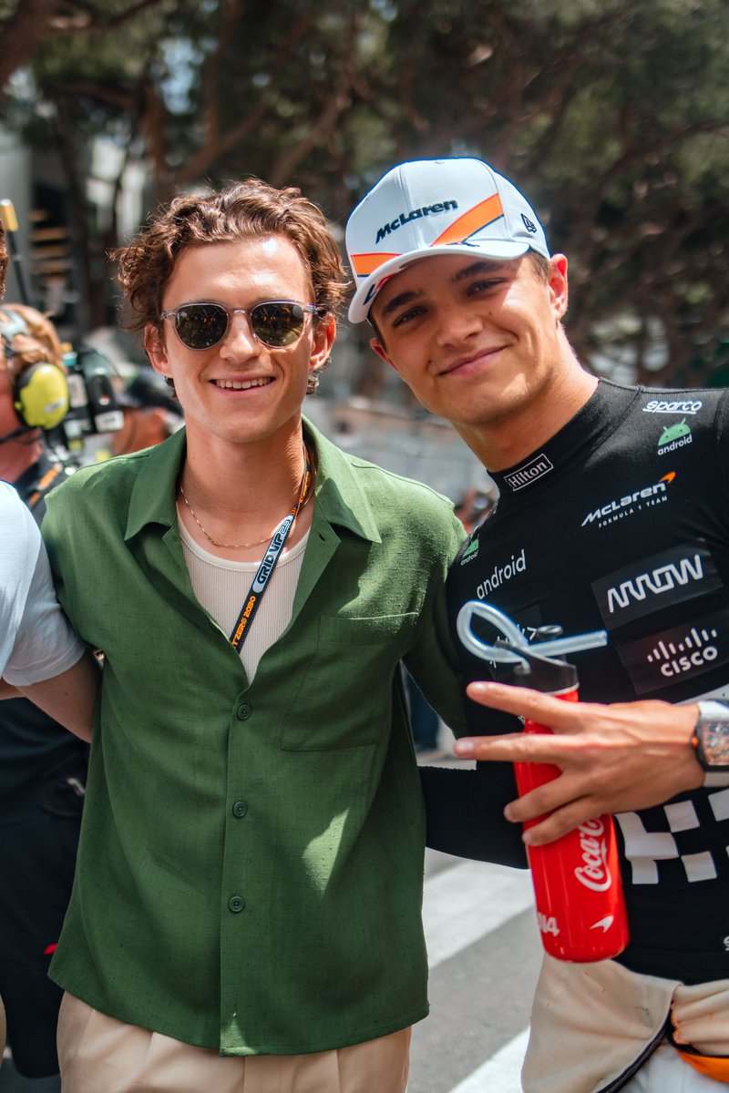 McLarenF1's tweet photo. This moment on the grid. @TomHolland1996 @LandoNorris 🕷🏁 

#MonacoGP 🇲🇨 https://t.co/LLAK1UtCQn