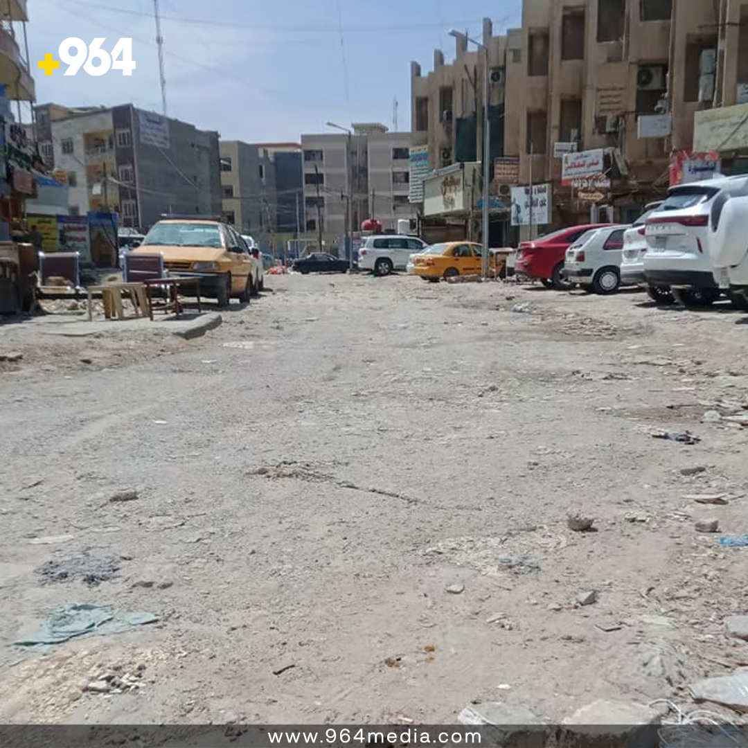 964English's tweet image. Despite its prime location near the post office, medical clinics, law offices, and currency exchange companies, Al-Bawi Street in New Baghdad has been neglected by municipal paving for the past decade. #InfrastructureIssues