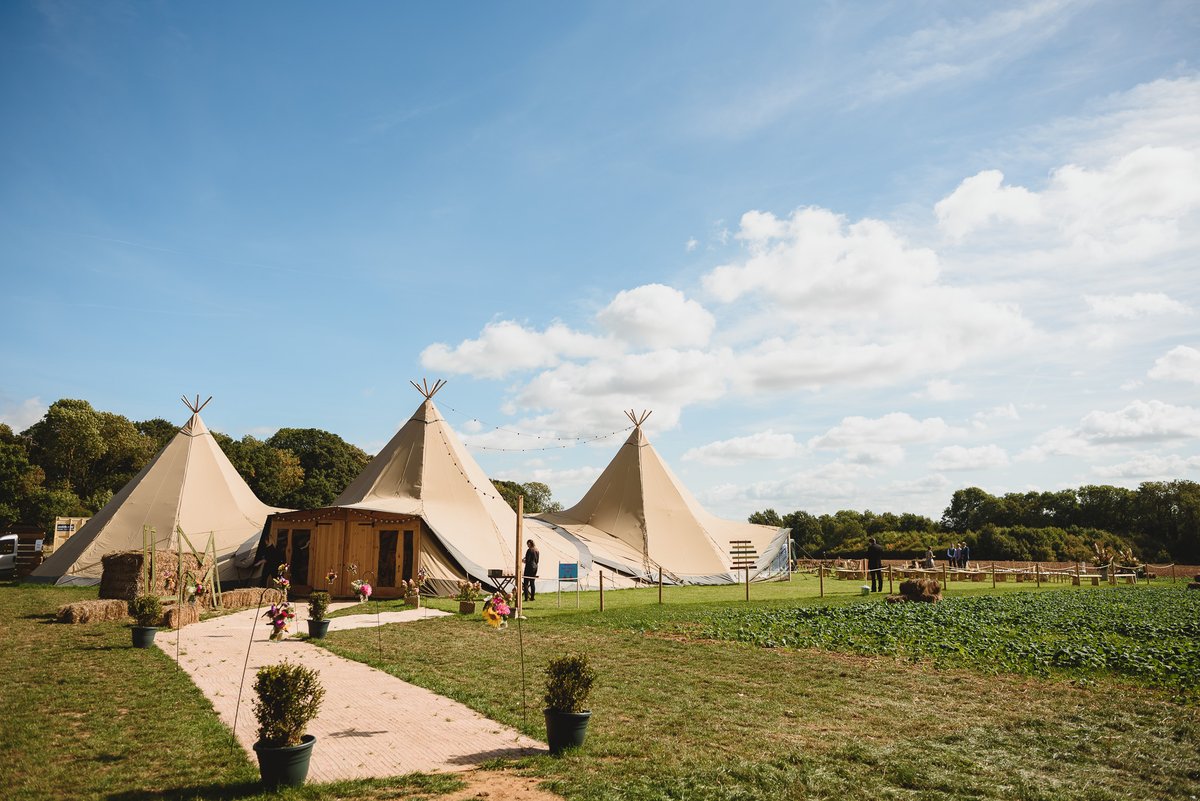 Dreamin' of a Tipi Wedding? Get ready to be swept away by the beautiful Northamptonshire countryside at Elms Meadow! #tipiwedding #tipiweddingvenue #northamptonshirewedding #2023wedding #teepeewedding #FarmWedding #CountryWedding #WeddingFair #bride #groom #ElmsMeadow