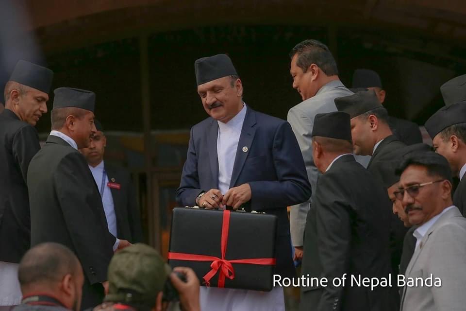 बजेट भाषण शुरू हुँदै: Finance Minister Prakash Sharan Mahat is ready for Budget Announcement as he brings the 'Briefcase' to the Parliament.