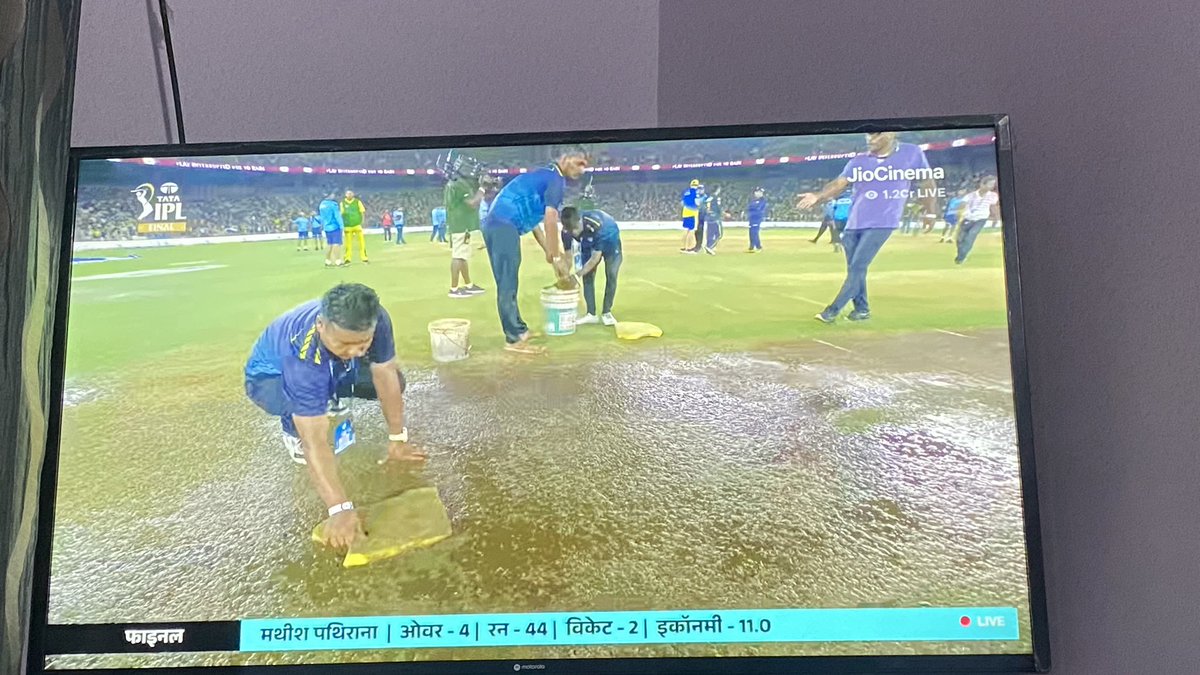 Pic 1 : ECB covering their ground with hover covers, covers a large portion and minimal manpower required to drag it.

Pic 2 : BCCI using sponges to soak water

Please Note that BCCI is 728% richer than the ECB 
  
#IPL2023Finals #CSKvGT